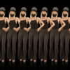Beauty-Blonde-Girl-Team-in-Covid-19-black-mask-dancing-on-black-background-4K-Video-VJ-Footage-1920_002 VJ Loops Farm