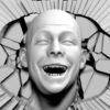 Bold-Head-with-happy-face-comes-through-the-wall-projection-mapping-Loop-iredmj-1920_005 VJ Loops Farm
