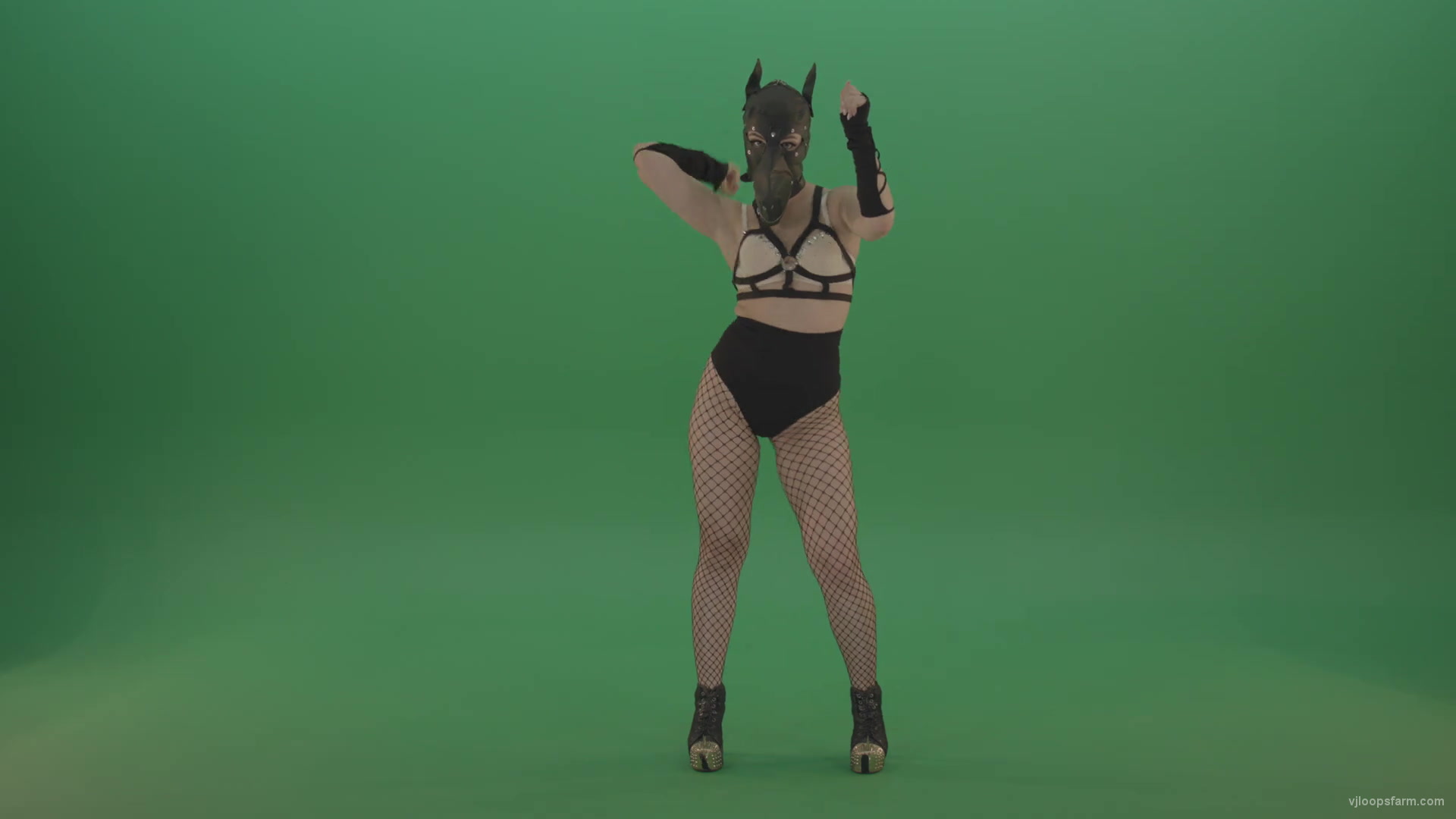 Girl in wolf fetish mask making hand beat on green screen